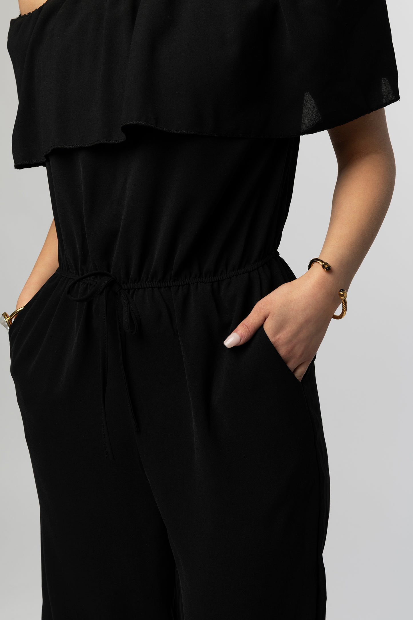 Tove ruffled black jumpsuit