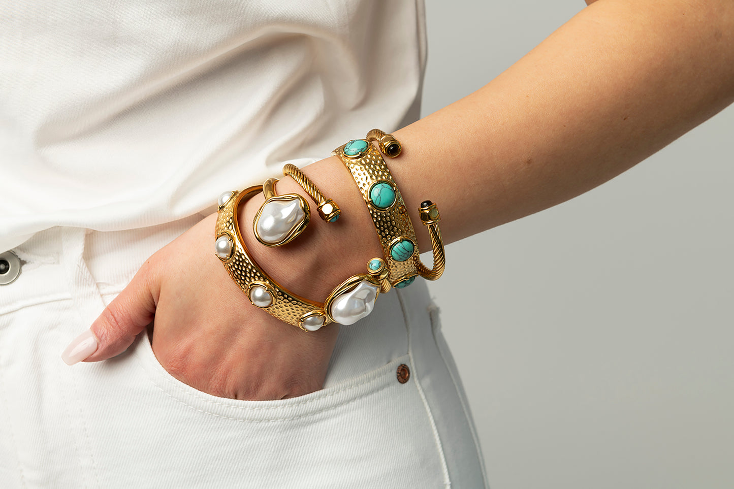 Cable cuff with turquoise stones