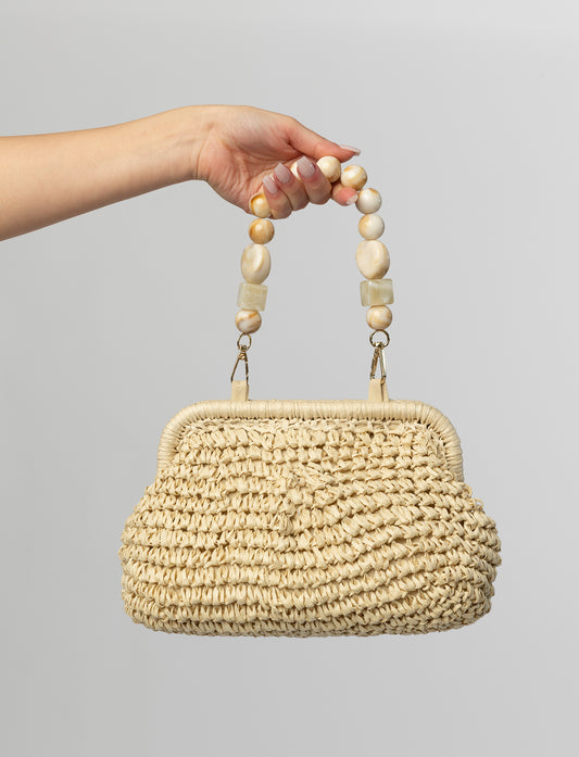 Beige woven clutch with beaded handle