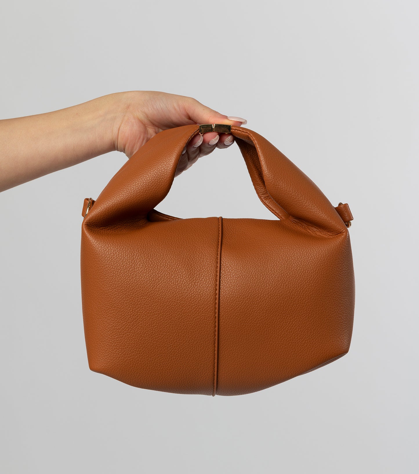 Camel leather top handle bag with buckle