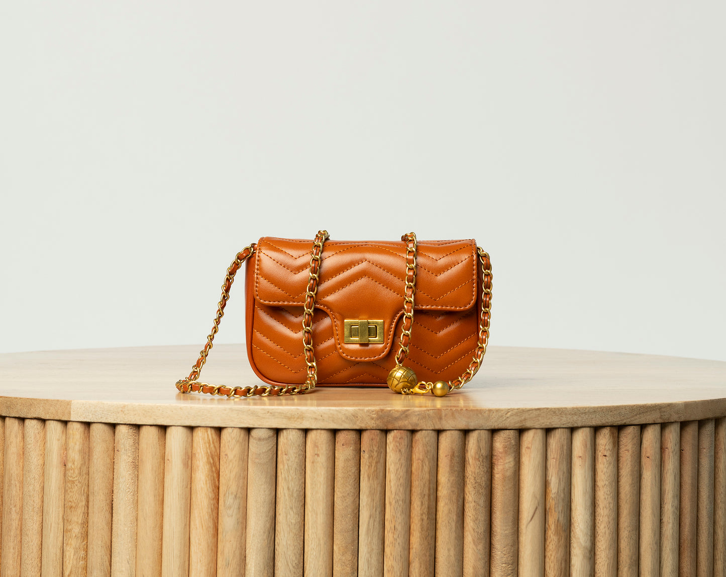Camel herringbone leather crossbody bag